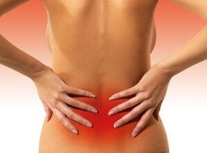 causes pain in the spinal cord in the lumbar region