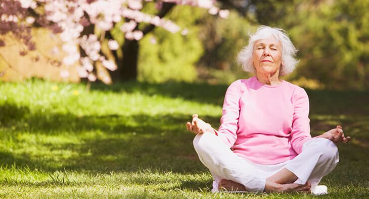 old women meditate with hip arthrosis